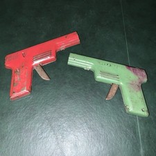 Vintage Lot Of 2 1940s WYANDOTTE Pressed Steel Red Green RARE Water Pistols
