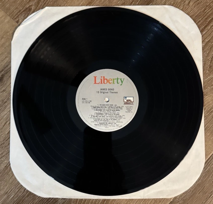 James Bond 13 Original Themes Vinyl Paul McCartney Louis Armstrong Carly Simon - Image 3 of 4