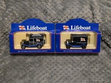 2X LLEDO ROYAL NATIONAL LIFEBOAT INSTITUTION VANS DIE-CAST MODELS NEW IN BOX B2