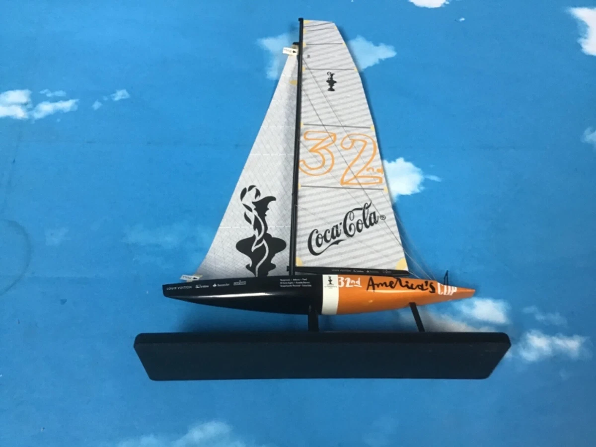 AMERICAN CUP SAILING BOATS. 10 SIZE APPROX ORANGE HULL AND BLACK