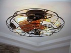 Antoine 20 in. 4-Light Indoor Black Wood Grain Industrial Metal Cage Ceiling Fan