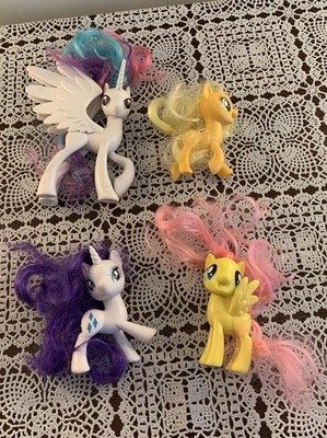 Four Hasbro My Little Pony Toys Rarity Celestia Apple Jack Fluttershy Gen 4
