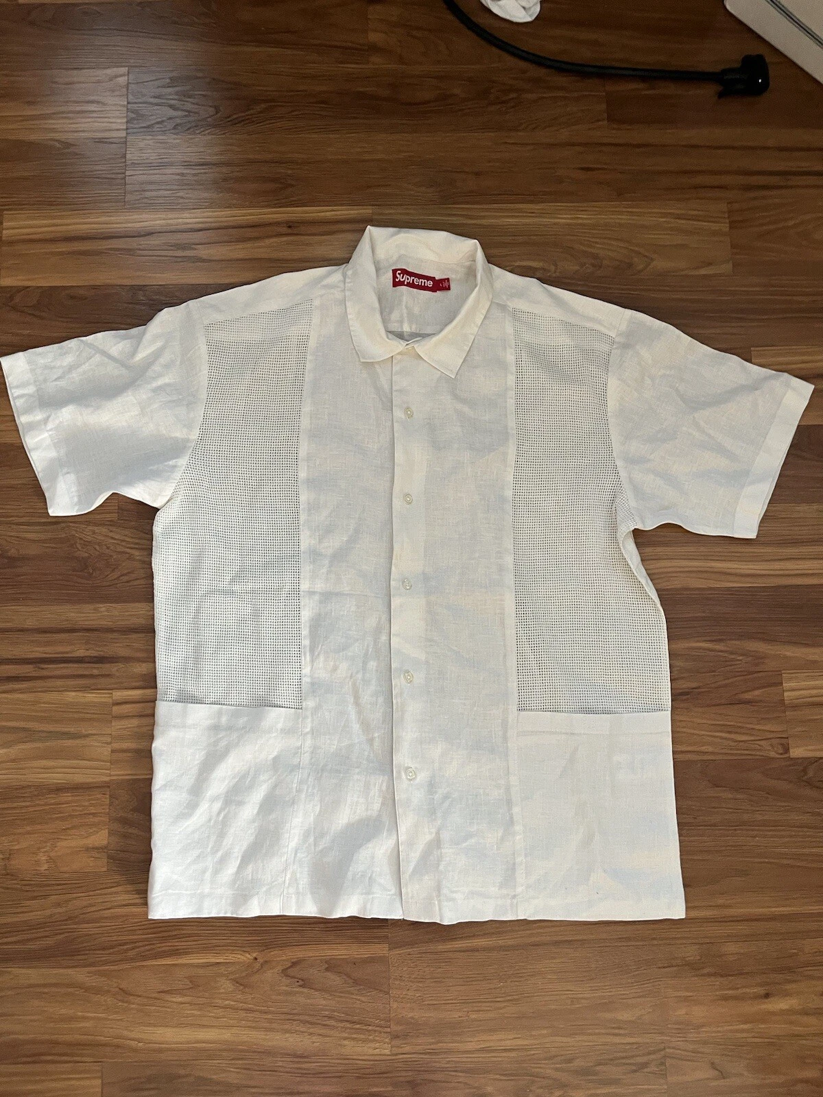 Chemise boutonnée en lin manches courtes panneau maille suprême blanc homme taille L