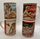 4 Vintage Coca-Cola "Through the Years" Pinup Mugs -‘43, ‘46, ‘50, ‘52