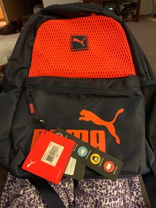 mochila puma naranja