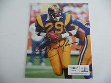 ERIC DICKERSON LOS ANGELES RAMS AUTOGRAPHED PHOTO IN CLASSIC GOLD & BLUE UNIFORM