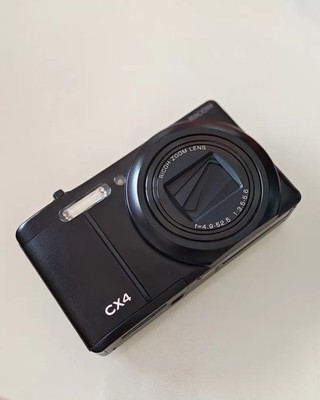 Ricoh CX4 Black 10MP  Compact Digital Camera 10.7x Optical Zoom English