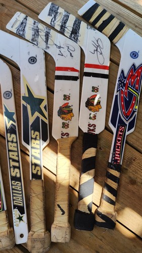 lot of 7 hockey stick branded for the Columbus Blue Jackets and Dallas Stars