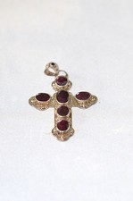 silver and garnett cucifix pendant