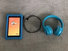 Amazon Kindle Fire with Wireless Bluetooth Headphones and charging cord
