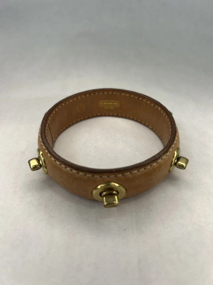 Auténtica pulsera de cuero Coach Turnlock Foto 3 de 4