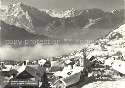 Amden Walensee SG Ortsansicht mit Kirche Nebelmeer Rautistock Alpenpanorama