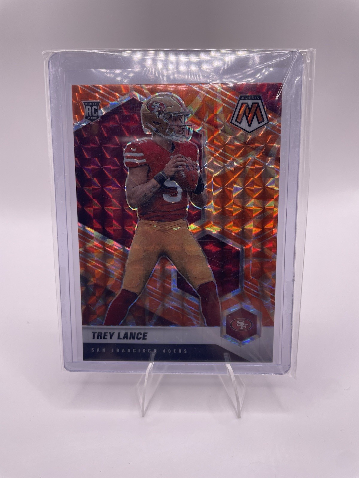 2021 Panini Mosaic - Rookies Trey Lance #303 Mosaic Reactive Orange Prizm (RC)