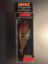 (A) Rapala CNR-8 Clackin' Rap 08 Lipless Crankbait GOLD - Discontinued ￼
