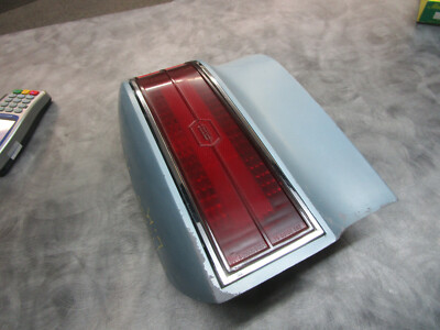 1976 1977 CUTLASS SUPREME TAIL LIGHT ASSEMBLY WITH QUARTER EXTENSION LEFT SIDE 