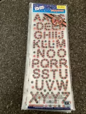 Bag of 12 Packages: EK Success M&M Halloween Adhesive Alphabet 2 Sheets/Package.