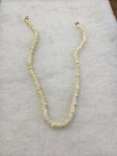 Vtg yellowish genuine Puka shell beaded GT barrel clasp Necklace
