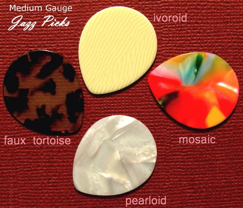 4 Jazz Gibson Les Paul / Gibson Star Shaped Guitar Picks - Medium Gauge Unused