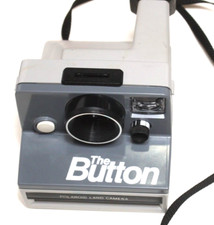 POLAROID CAMERA-THE BUTTON-TESTED-WITH STRAP