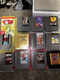 Nintendo NES Action Set System w/ Box, 2 Controllers, Zapper, + 12 Games