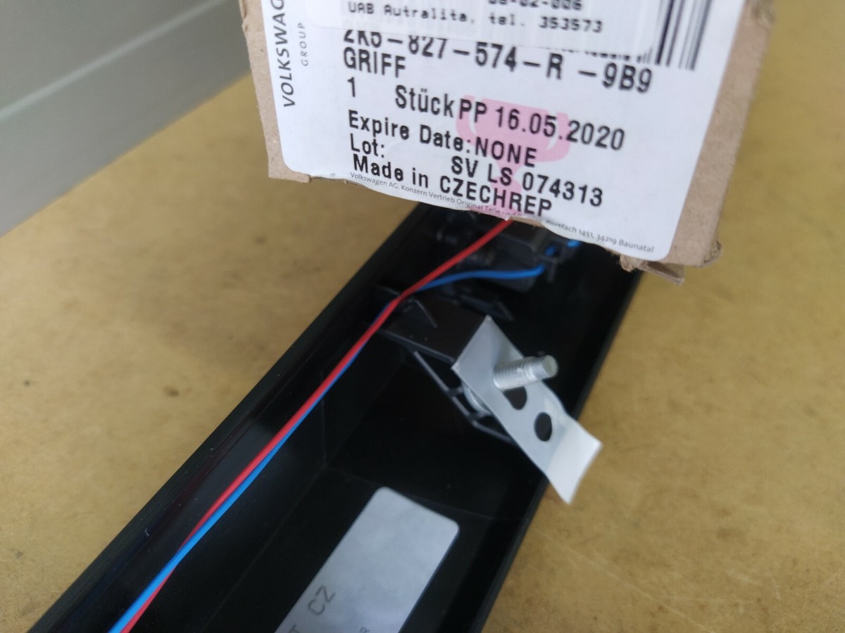 NEW Genuine OEM VW CADDY GRIP MOLDING, LICENSE PLATE LIGHT  