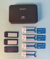 Lot 256MB SanDisk Memory Stick Pro Duo  Adaptors  3 Sony Memory Sticks  Case