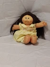 New ListingVintage 1985 Cabbage Patch Kids Brown Hair & Brown Eyes Wearing Yellow Outfit