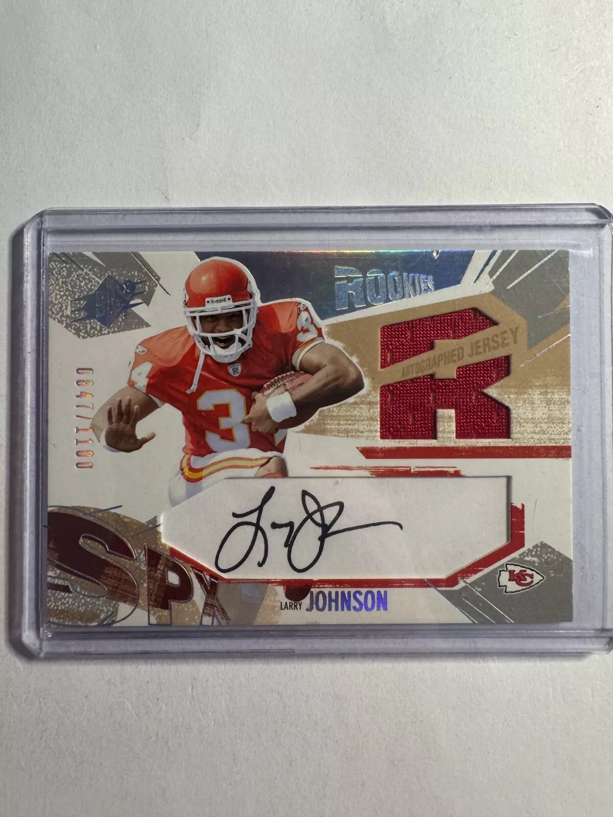 K308,293 - 2003 SPx #205 Larry Johnson Jersey Auto #/1100 RC