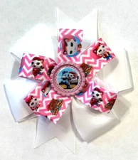 Beautiful Sheriff Callie and Sparky Inspired hair bow for girls.