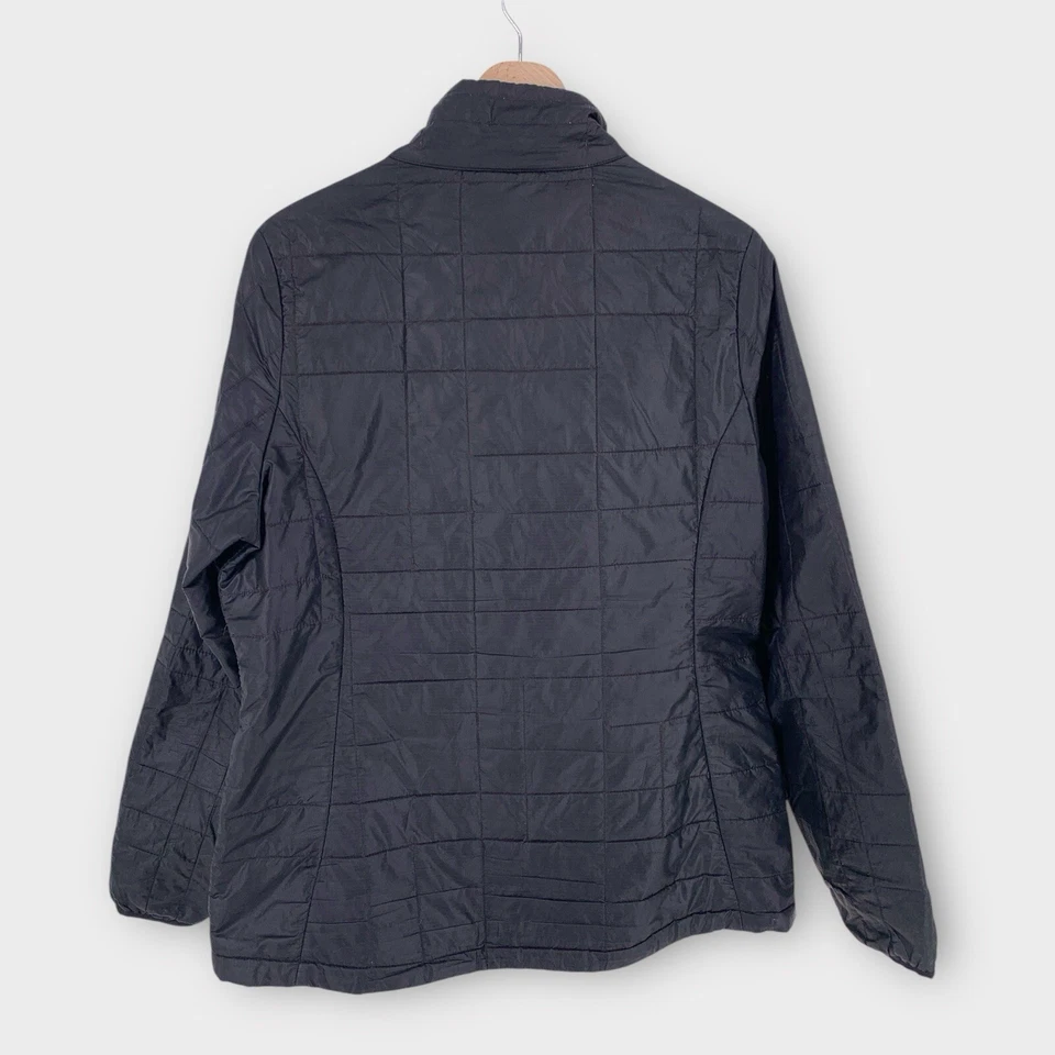 Chaqueta Isis Acolchada Ligera Media Cremallera Para Mujer Grande Negra Bolsillos PEQUEÑOS AGUJEROS Foto 2 de 4