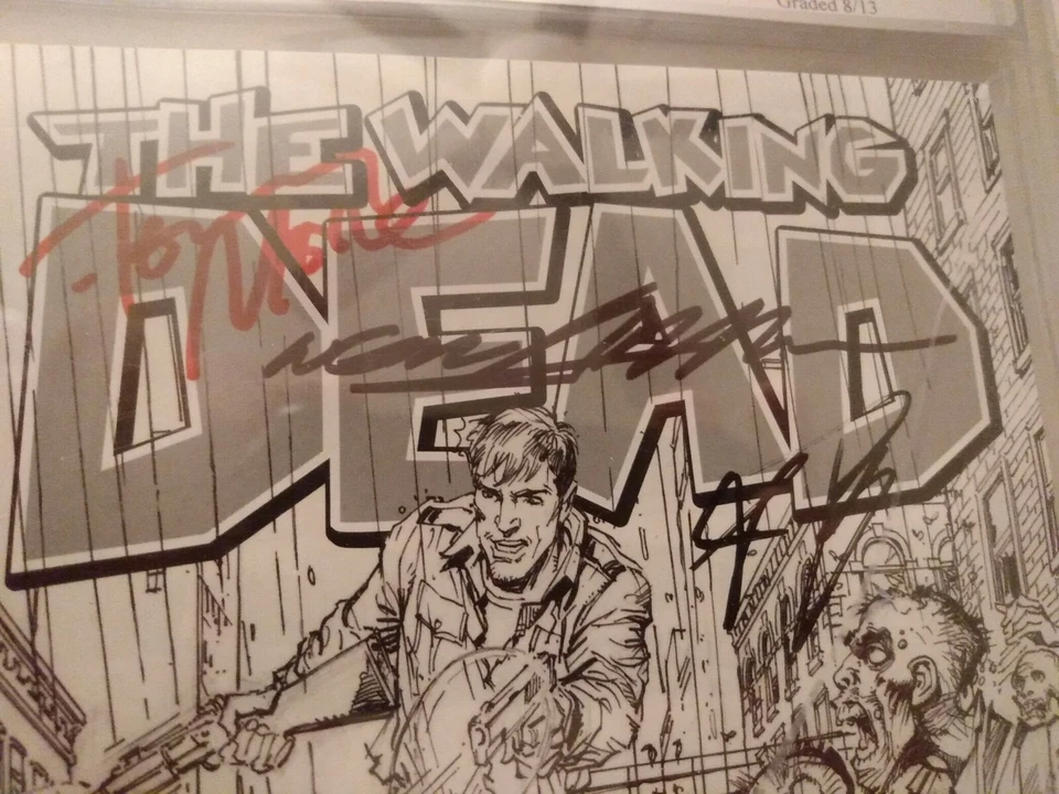 The Walking Dead #1 PGX 9.8 Signed by NEAL ADAMS, Rob Kirkman, & Tony Moore - Image 2 of 3