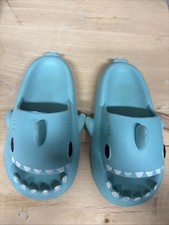 light blue novelty shark slides