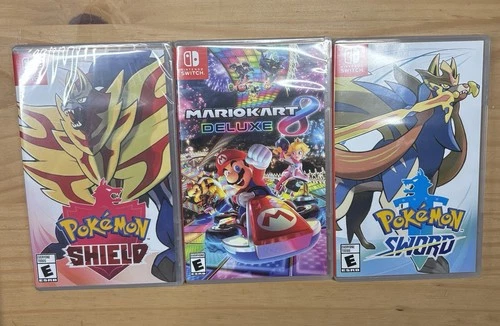 Pokémon Shield sealed, Pokémon sword, Mario cart 8 Delux Nintendo switch
