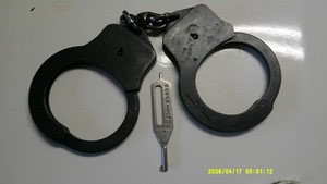 Harvard Lock Co handcuffs with key