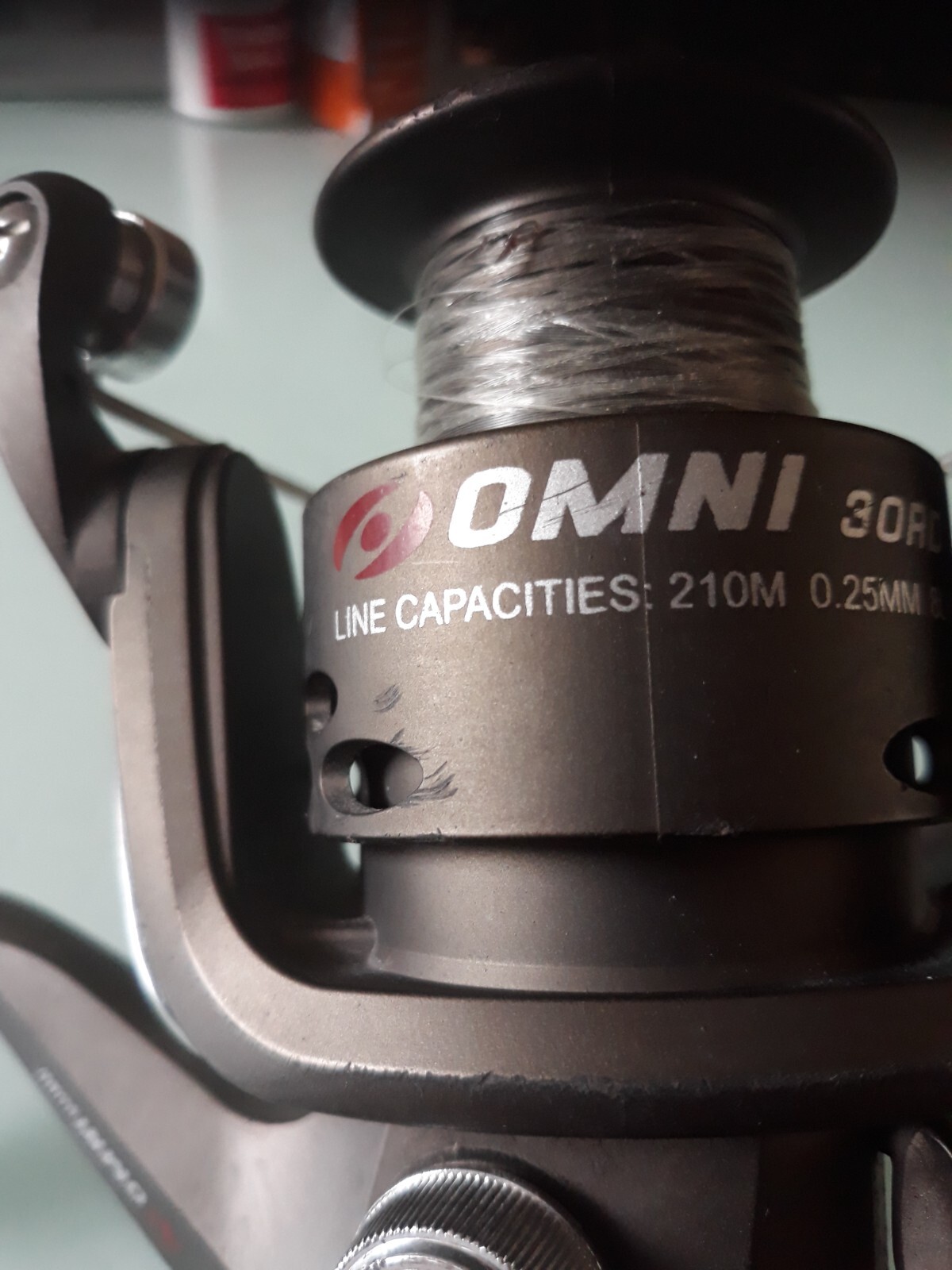 omni 30 rd fishing reel line capacities 210 m 0.25mm 8 lb shakespear