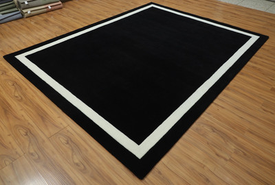 Classic Black & White Border Hand-Tufted Wool Area Rug. living room. bedroom