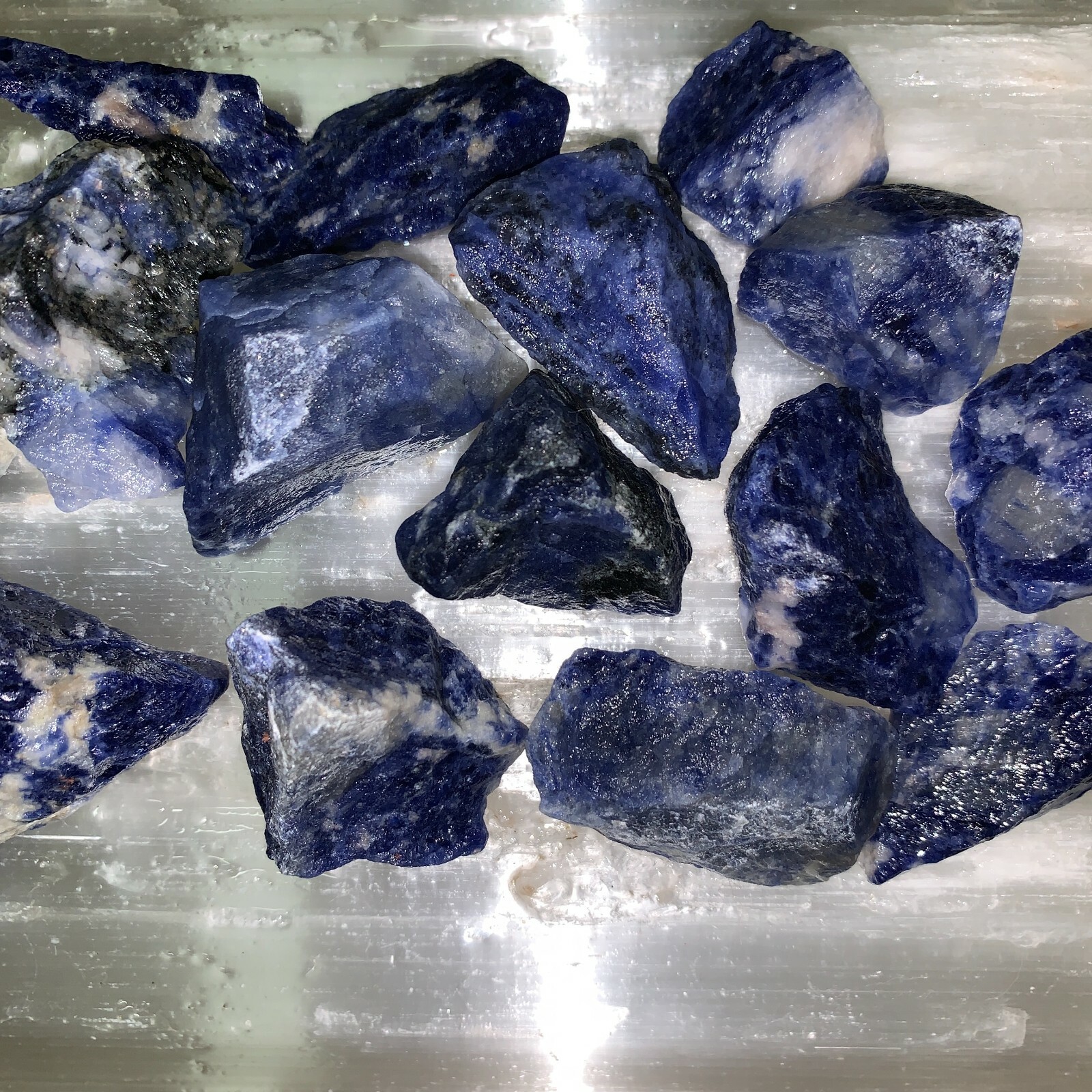SODALITE ROUGH, CHARGED 500 CARATS LOT + A FREE SELENITE CHARGING STICK