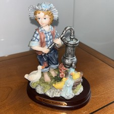 Child Pumping Water For Duck Friends On Wooden Base By The Juliana Collection 