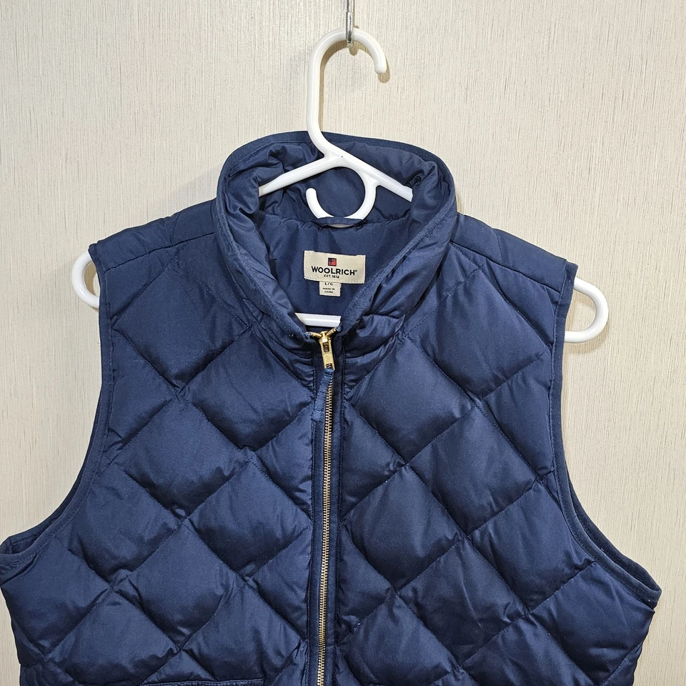 Chaleco acolchado Woolrich para mujer L azul marino con cremallera frontal dorado bolsillos a presión Foto 3 de 4