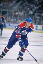 Defenseman Bryan Marchment Edmonton Oilers moves down the ice at a- 1995 Photo
