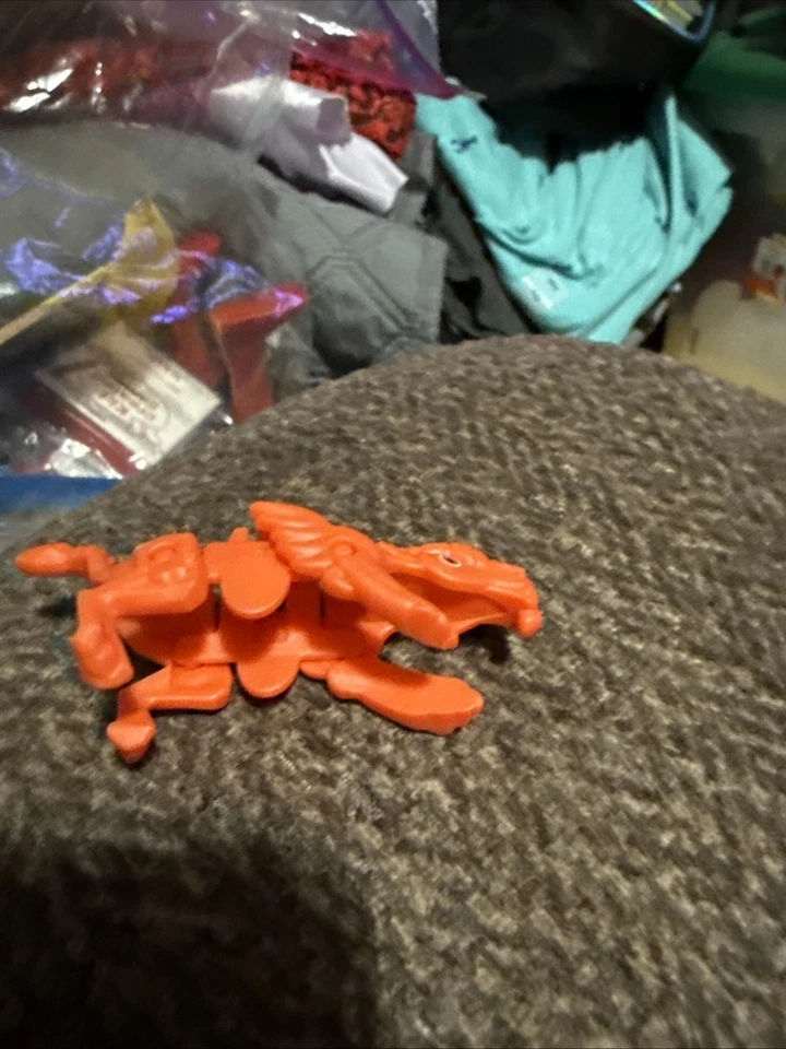 Juguete de caramelo para niños dragón naranja Foto 2 de 2