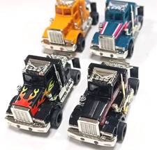 TYCO Peterbilt cabs with custom chassis lot of 4 trucks/unused.