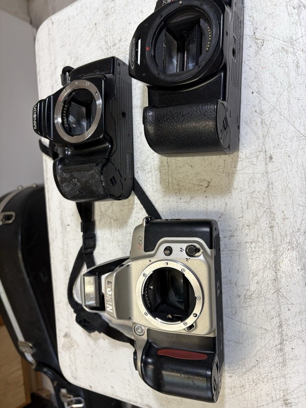 3 Camera bodys for parts Minolta ,Nikon, Canon