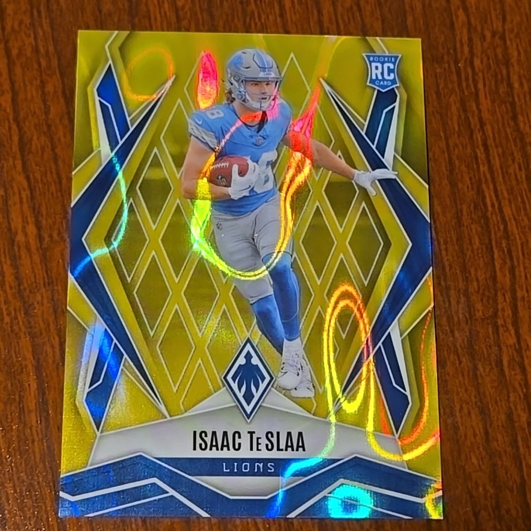 2025 Panini Phoenix - Rookies Isaac Teslaa #189 Yellow Lava 83/125 (RC)