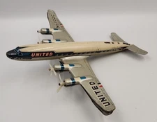 United Airlines Toy Airplane DC-7C Mainliner Vintage Japan Tin N6702C
