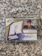 2005-06 UD SPX #242 Kevin Bieksa Rookie Jersey Auto /1999