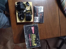 1 Garcia Mitchell 300 France and 1 Garcia Mitchell 308 Reel and Aquasonic lures