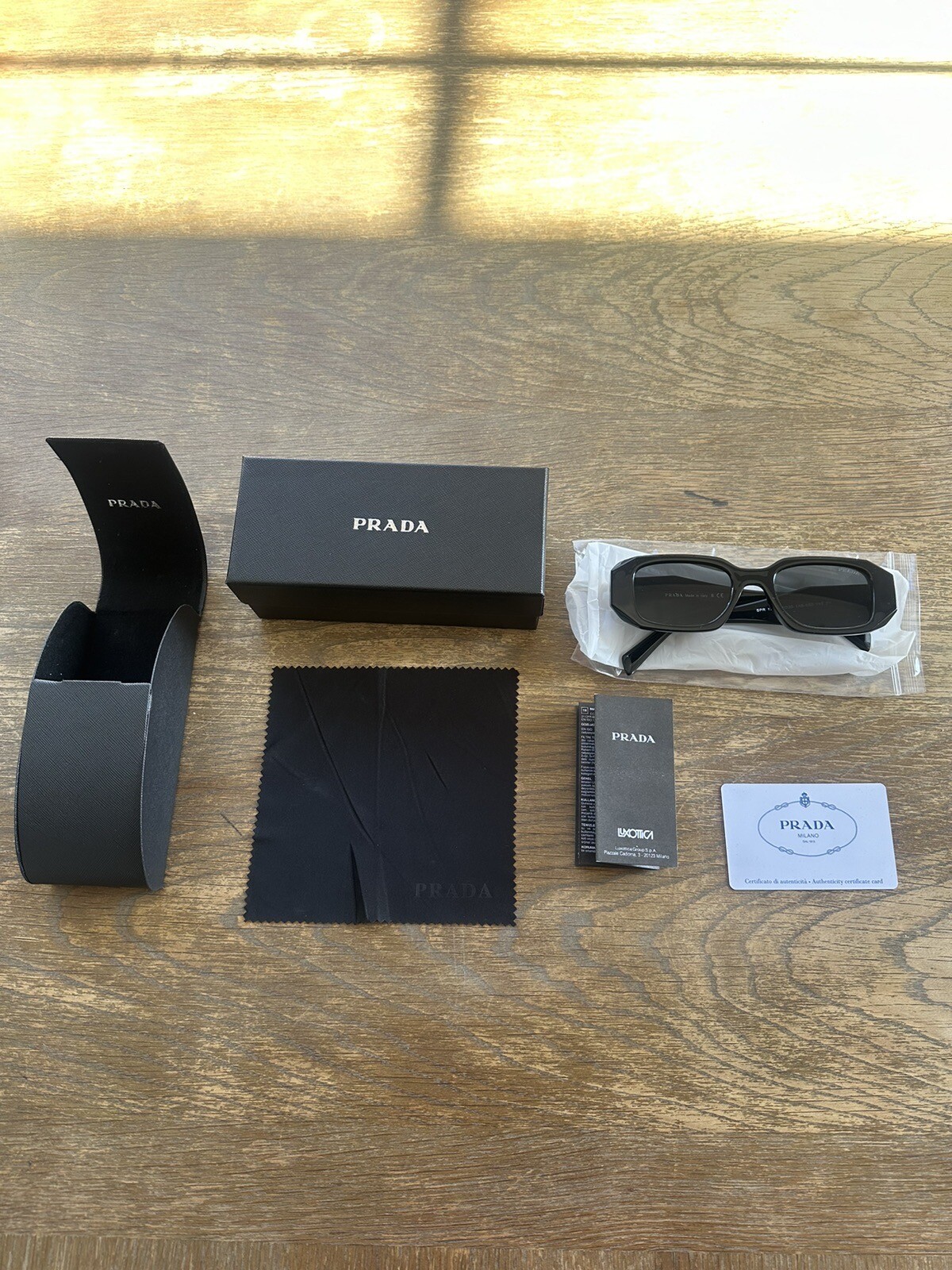 Prada PR17WS 1AB5S049 Women's Sunglasses 49 mm Black / Dark Grey Lens