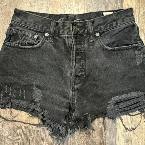 Vintage We The Free Black denim shorts with frayed hem and distressing