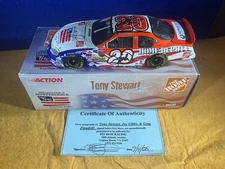 K12-6 TONY STEWART #20 HOME DEPOT / INDEPENDENCE DAY - AUTOGRAPHED X3 -JOE GIBBS